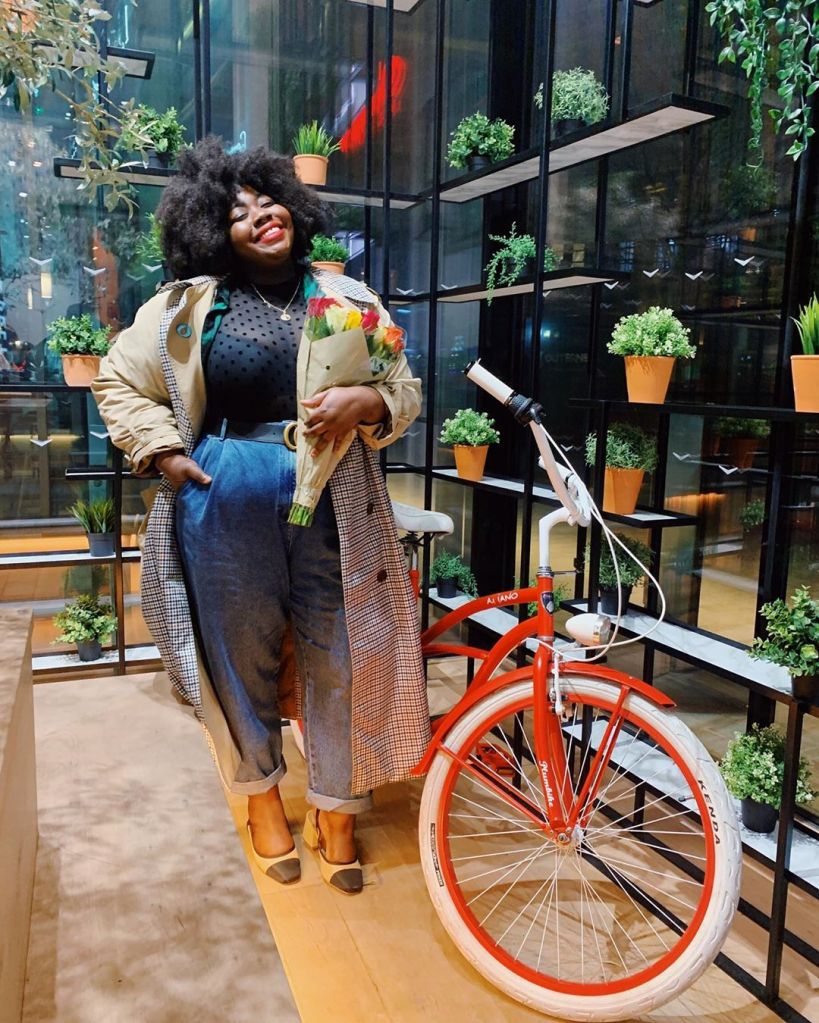 Stephanie holding a bouquet of flowers