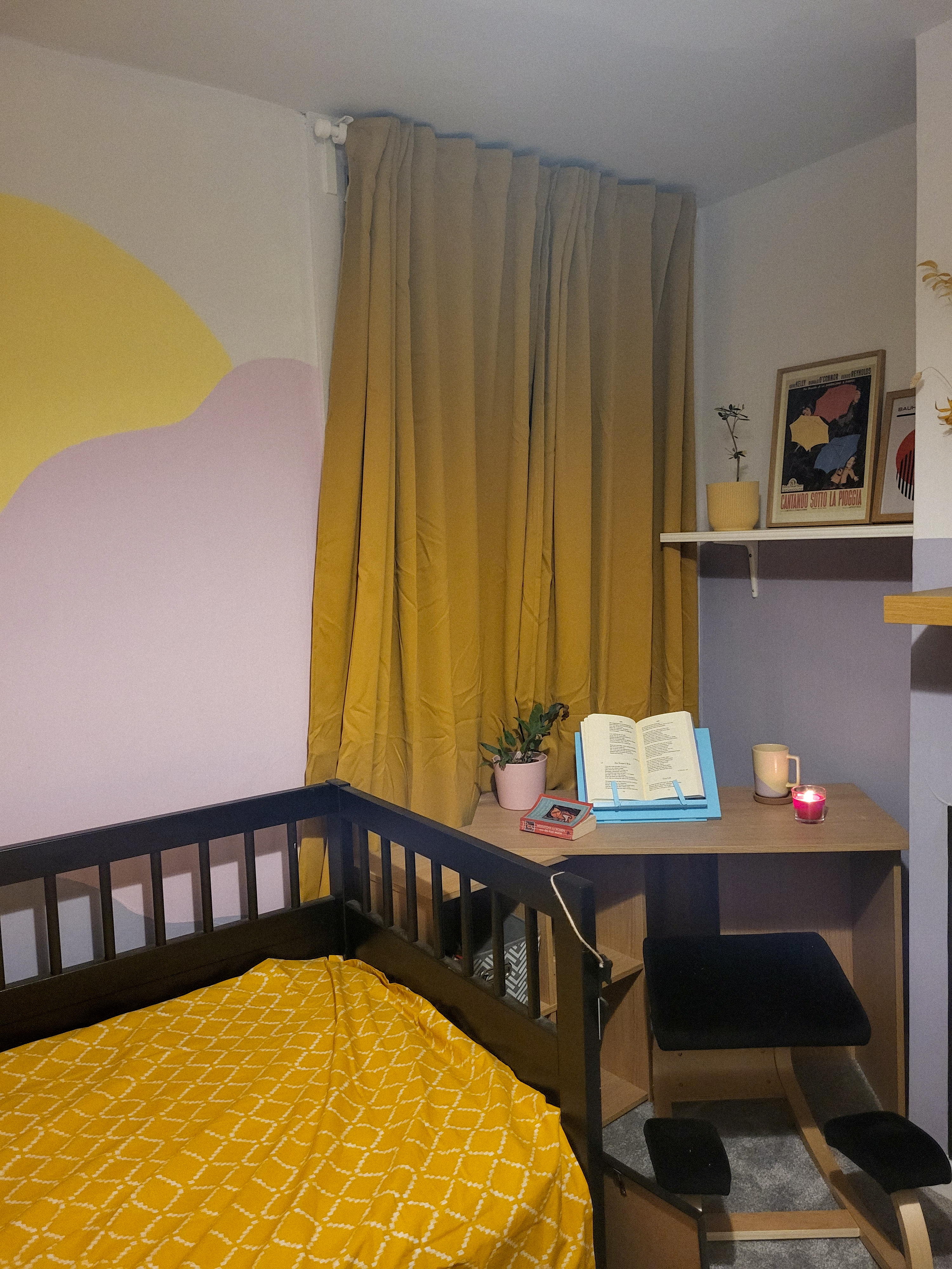A glimpse at the office corner with yellow curtains and a wooden desk
